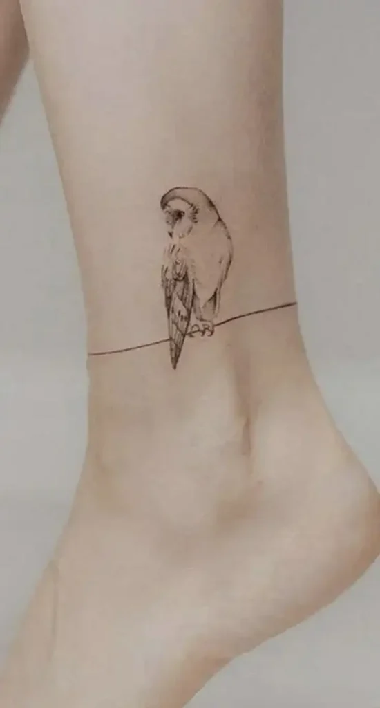 simple owl tattoo